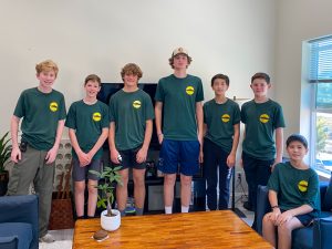 Orinda Boy Scouts Troop 237 standing together in the living room